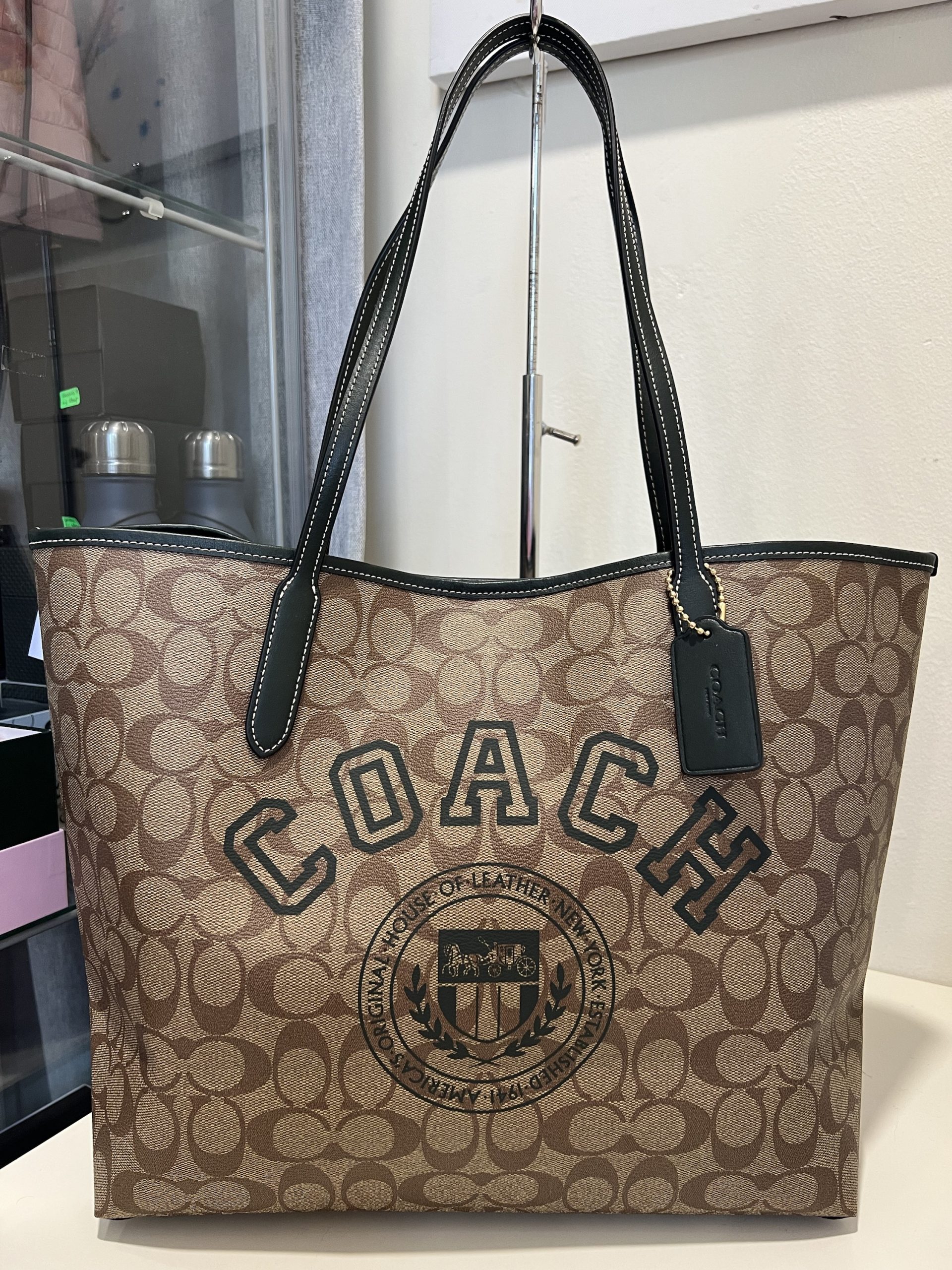 Coach City Tote In Signature Canvas With Varsity Motif