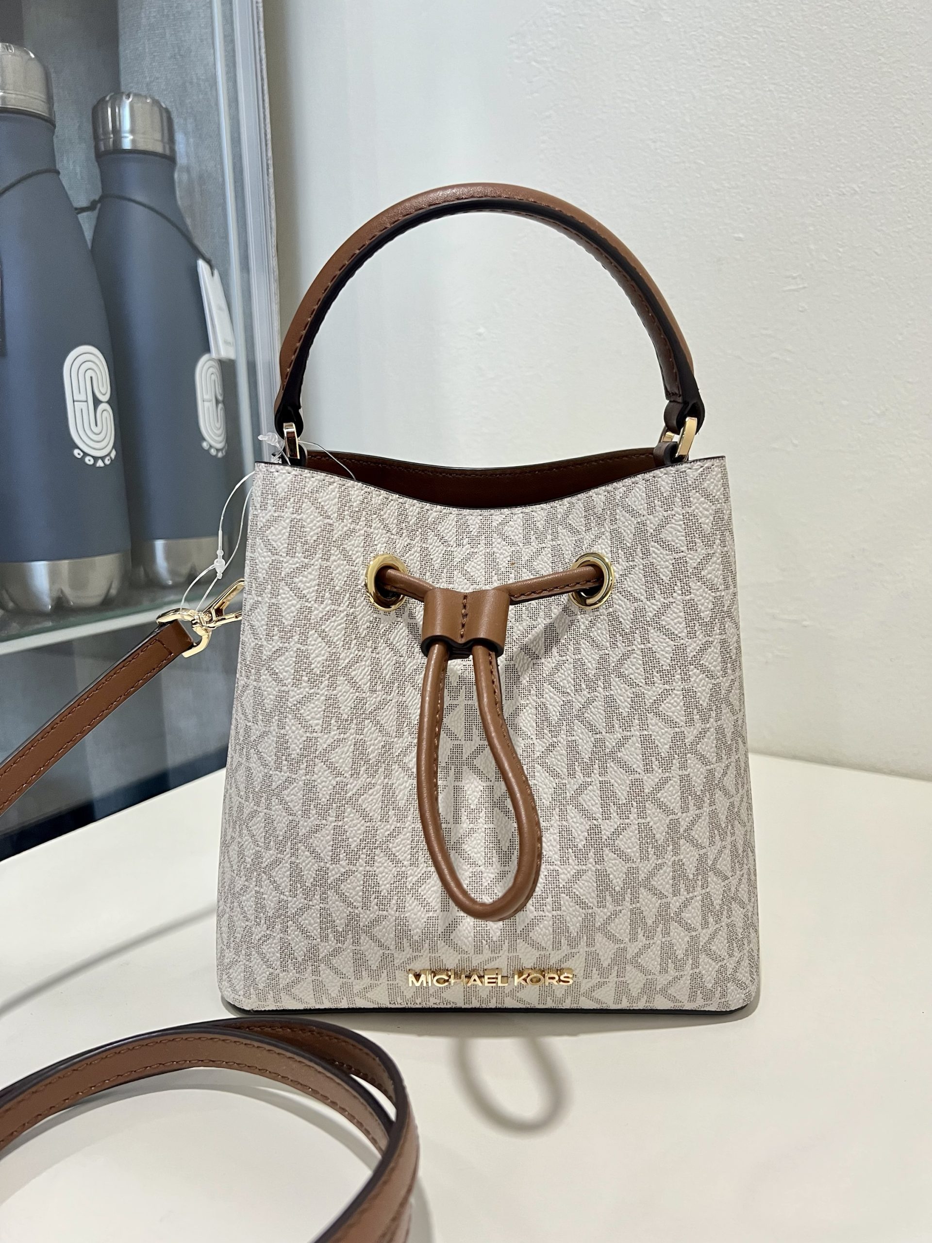 Michael Kors Suri Small Bucket in Signature Vanilla Exclusively USA