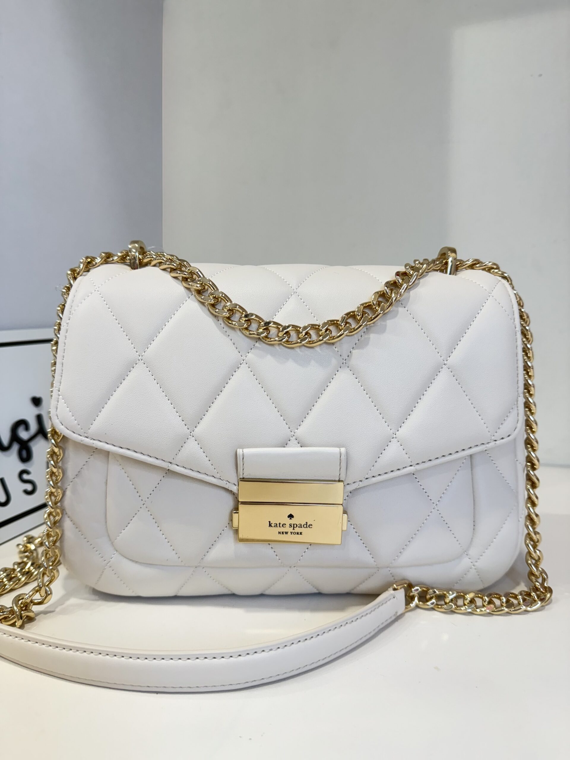 Kate Spade Carey Small Flap Shoulder Bag in Parchment