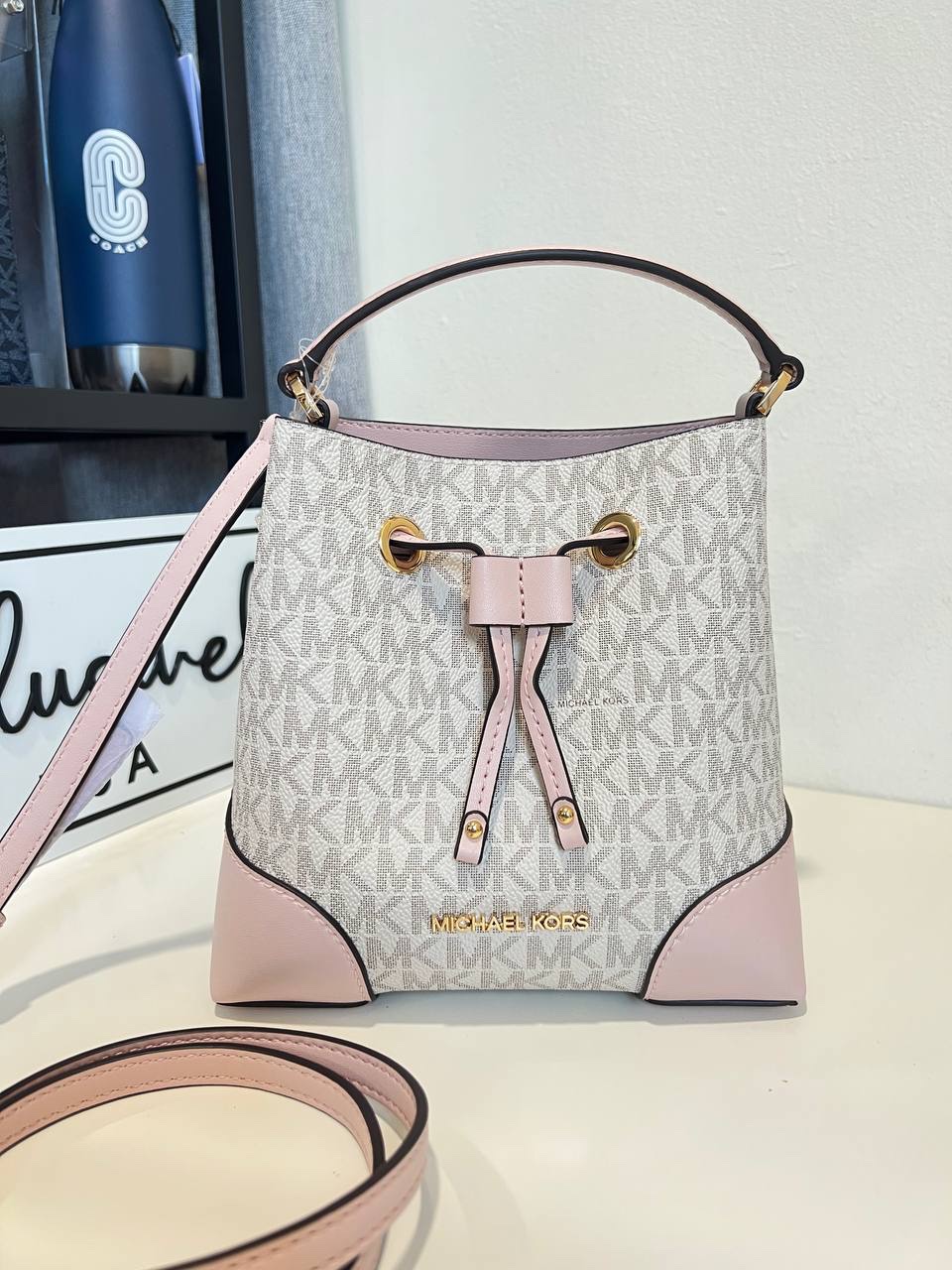Michael Kors Mercer Small Drawstring Bucket Messenger in Signature Vanilla / Powder Blush