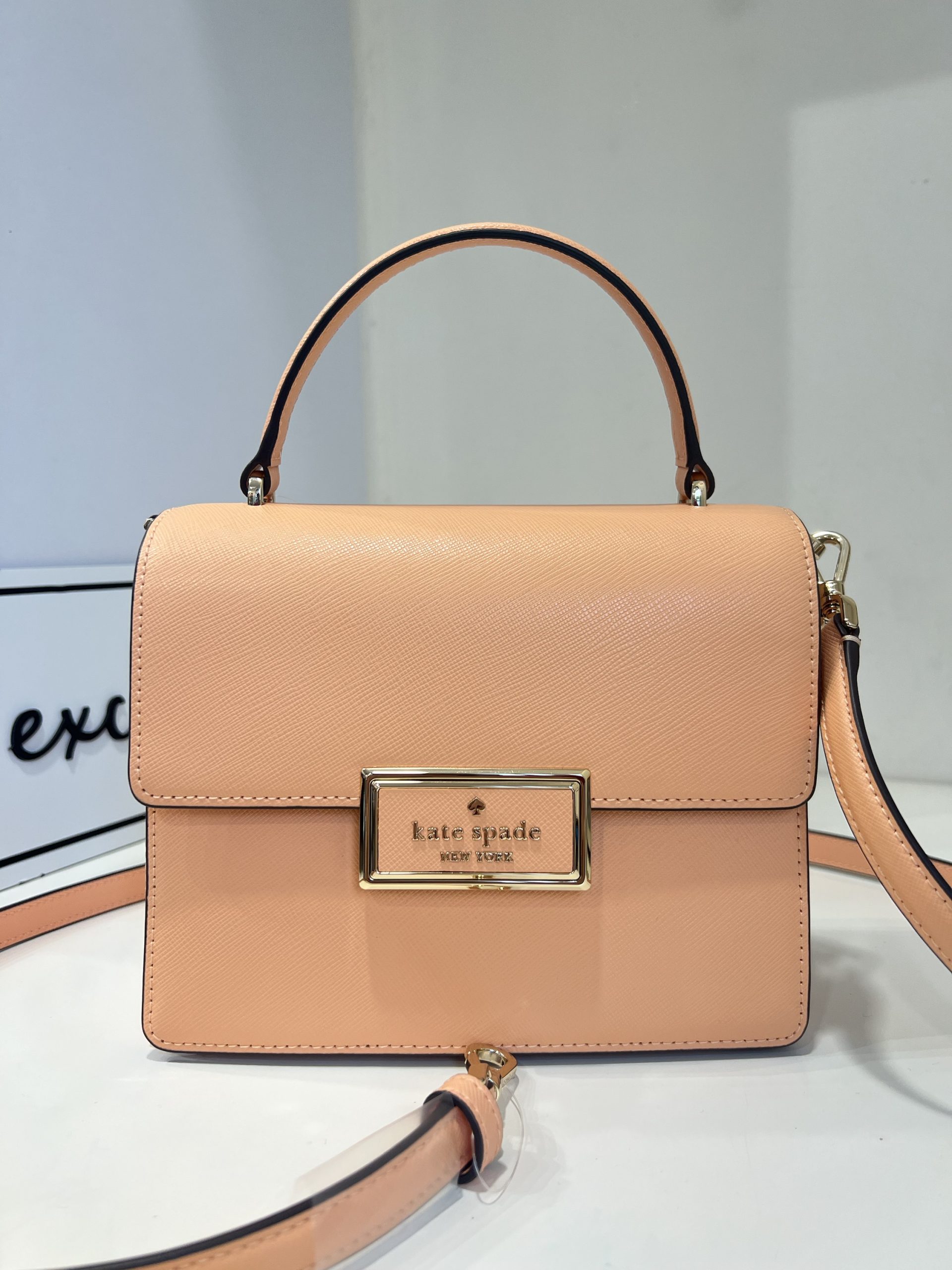 Kate Spade Reegan Top Handle Crossbody in Orange Cream