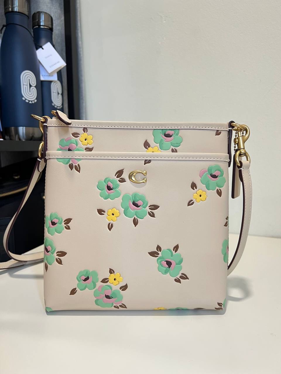 Coach Kitt Zip Leather Crossbody Messenger With Flower Print online