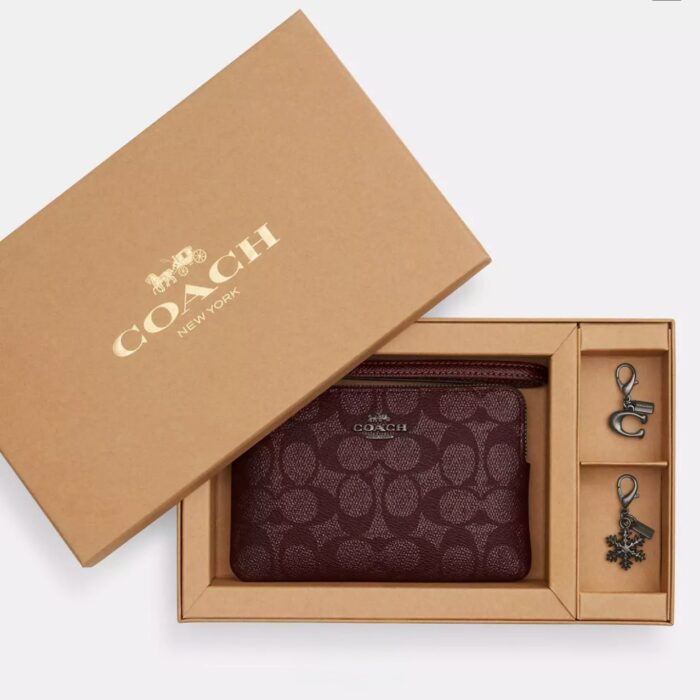 Coach Boxed Corner Zip Wristlet In Signature Wine Multi With Charms