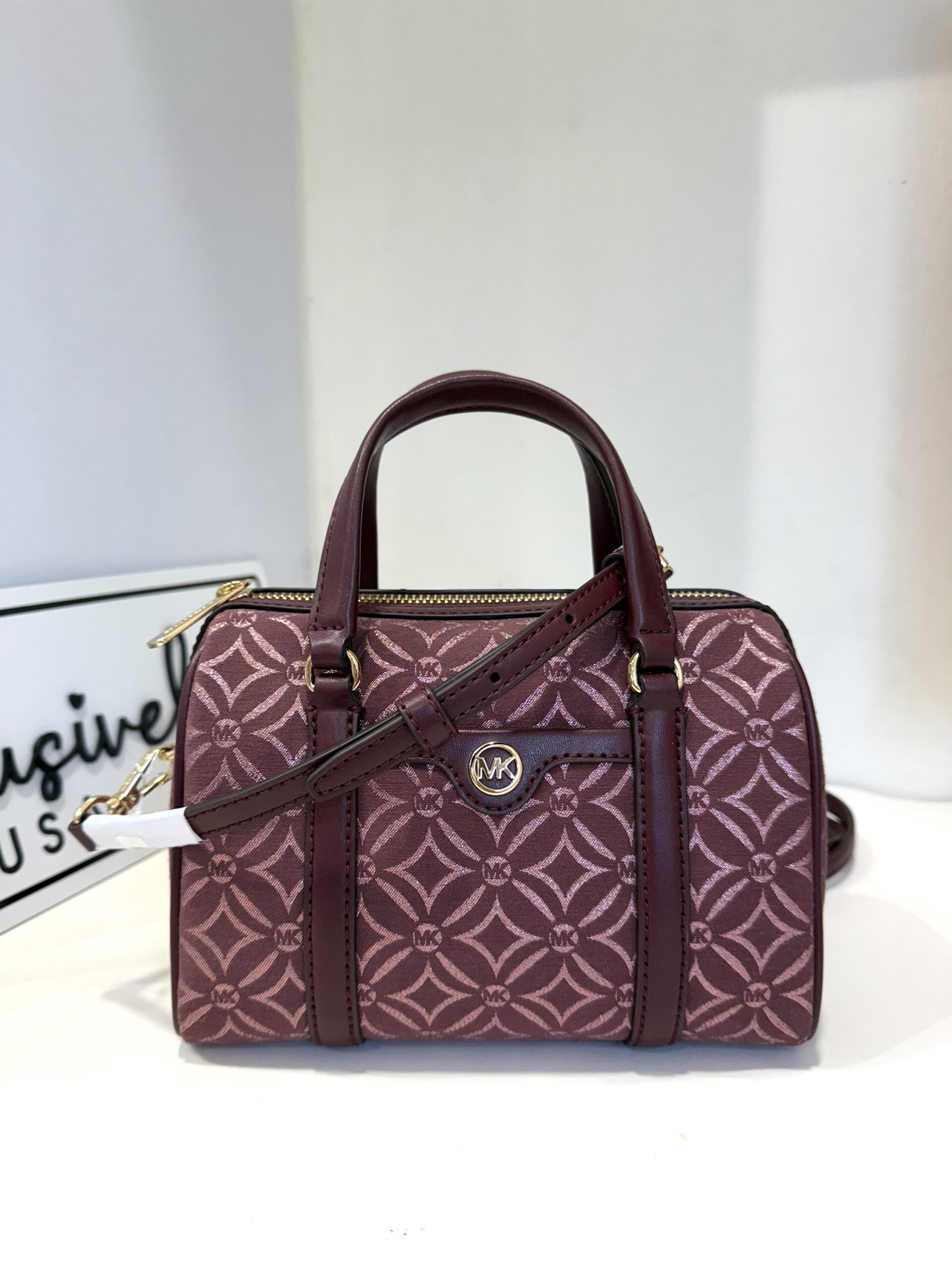 Michael Kors Small Metallic Logo Jacquard Duffle Crossbody Bag in Oxblood