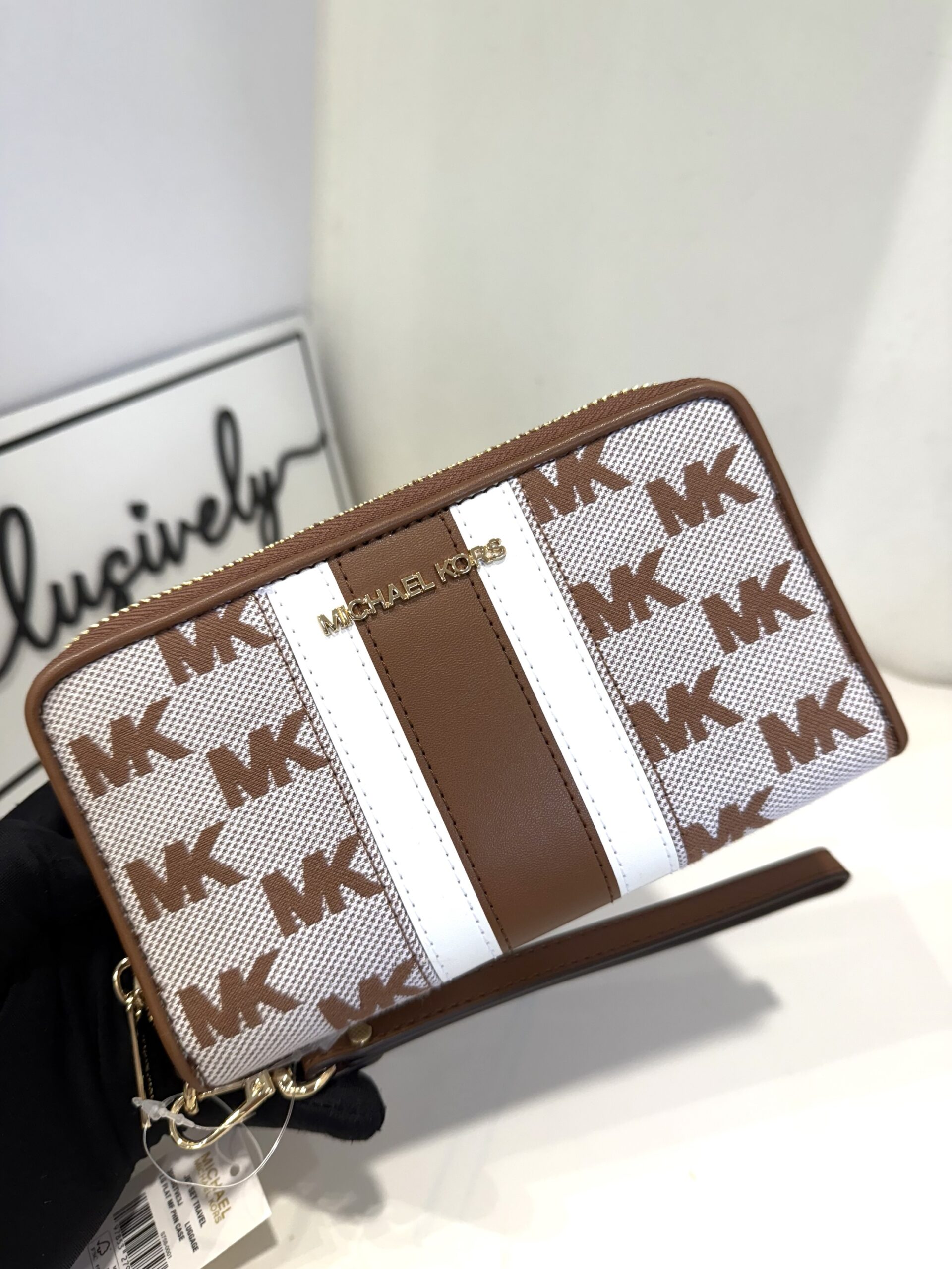 Michael Kors Jet Set Travel Large Striped Logo Jacquard Smartphone Wristlet in Luggage
